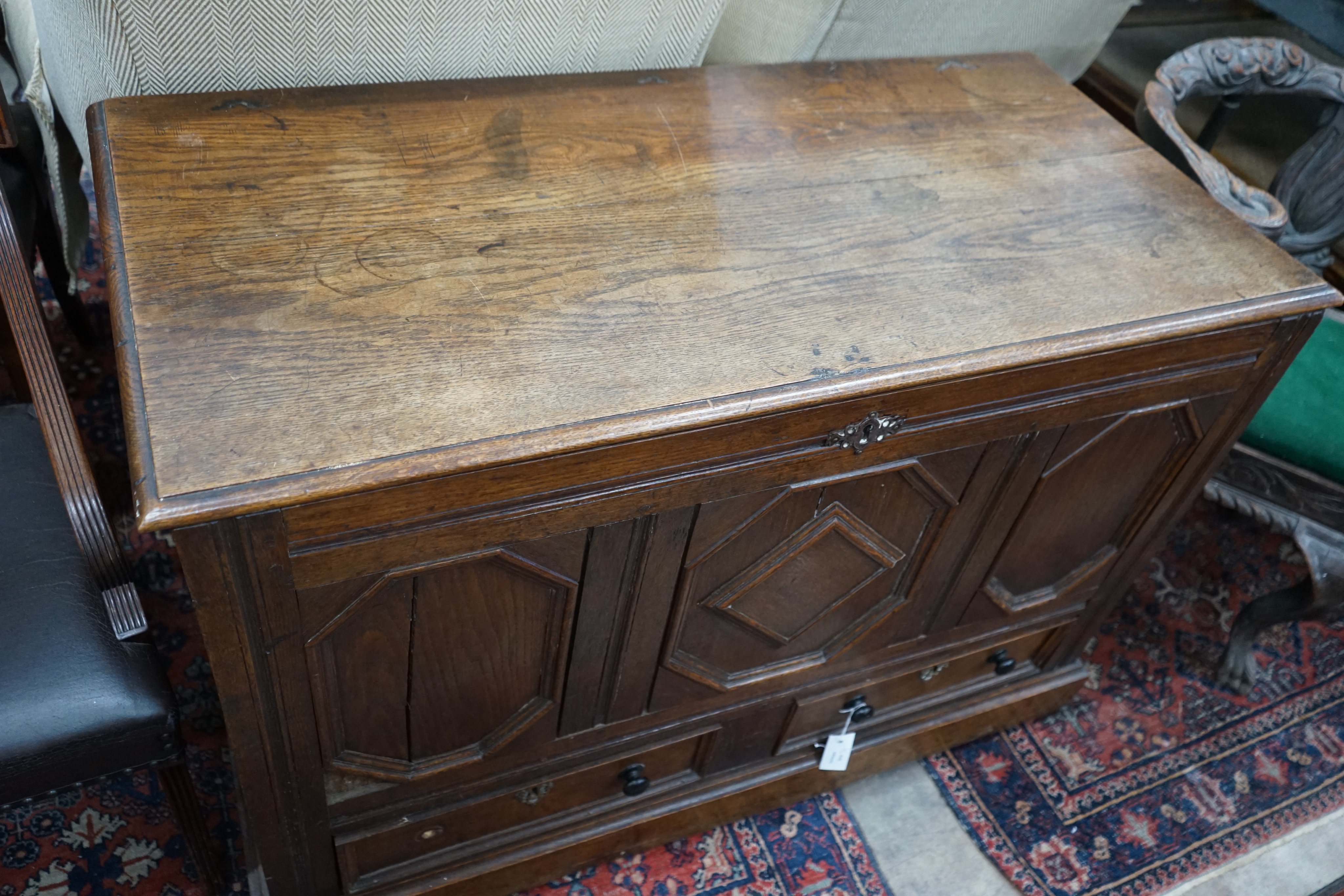 An 18th century oak mule chest, width 119cm depth 56cm height 81cm